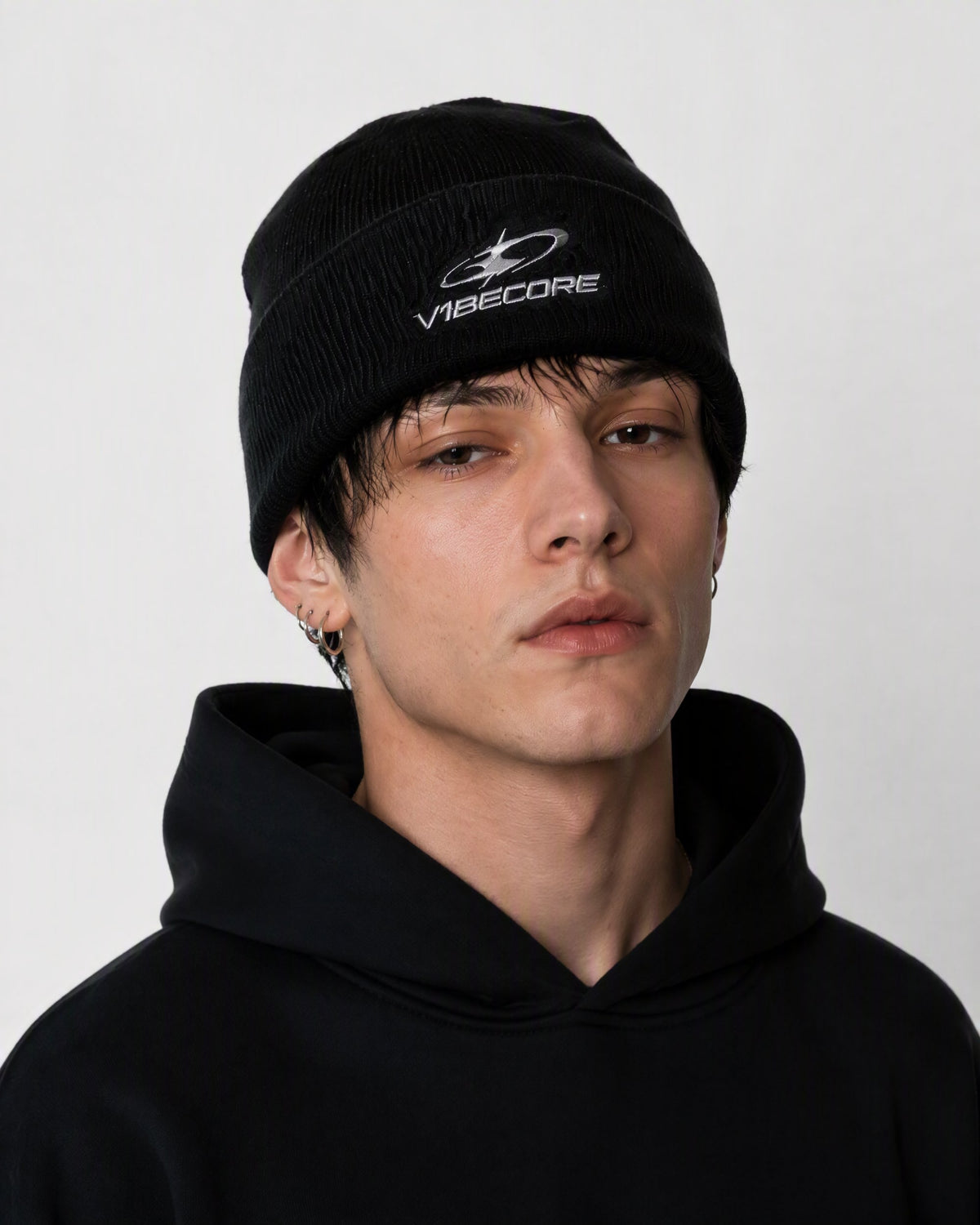 BLACK ORBIT BEANIE — worn, front view