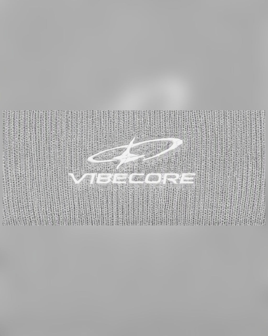 GREY ORBIT BEANIE — embroidered logo close-up