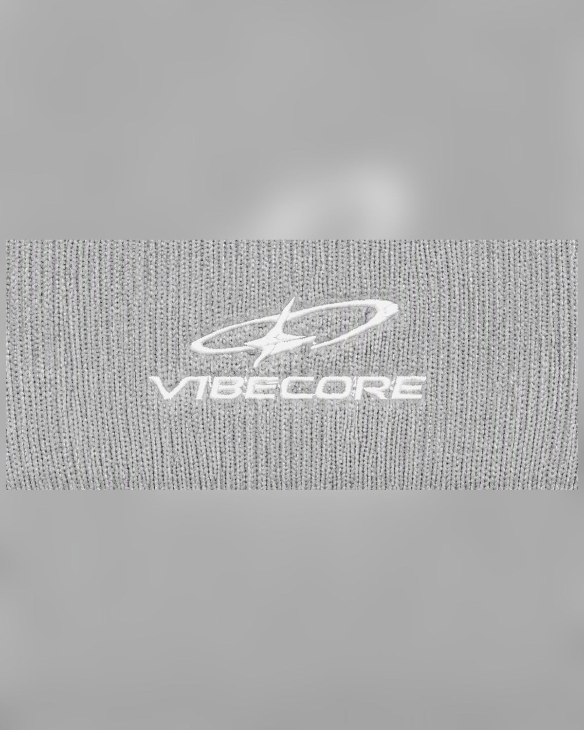 GREY ORBIT BEANIE — embroidered logo close-up