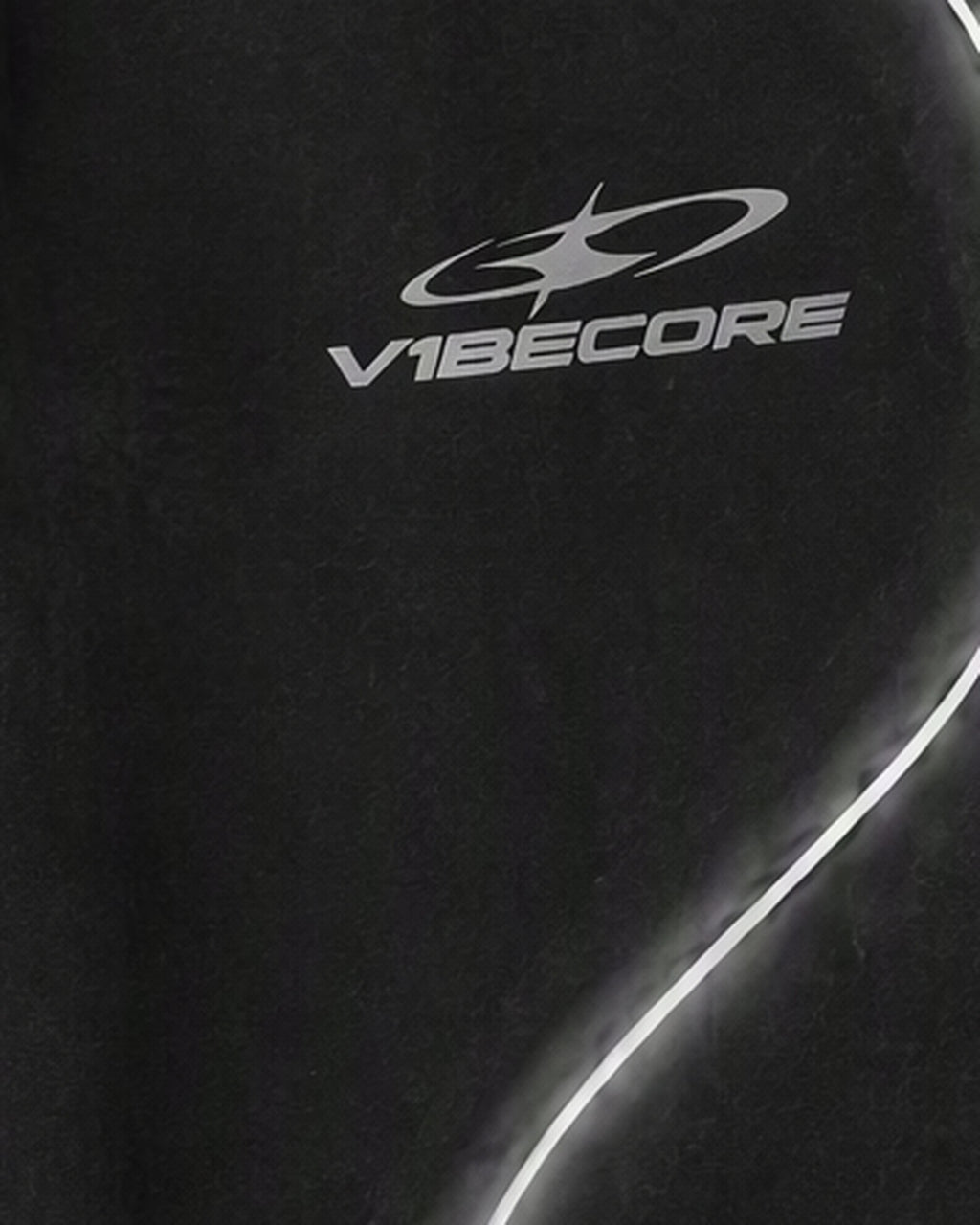 BLACK ORBIT JOGGER — embroidered logo close-up