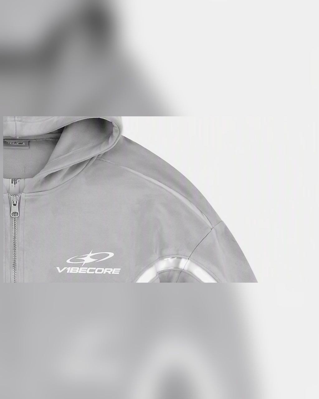 GREY ORBIT ZIP — embroidered logo close-up